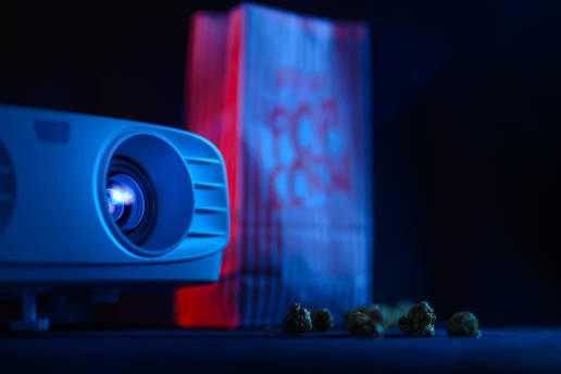 Projector light shining beside popcorn bag